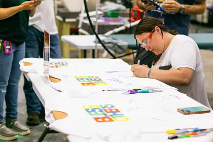 FOM25 T shirt Signing